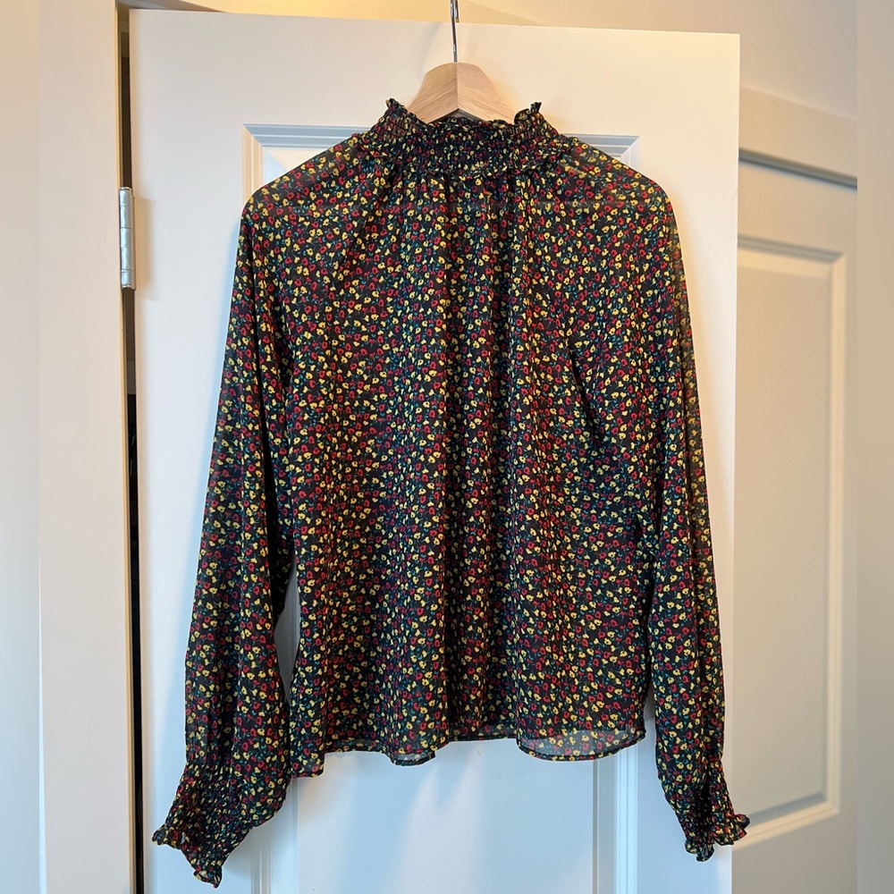 GAP. Size S. Black with red/yellow/green floral accents, sheer blouse.
